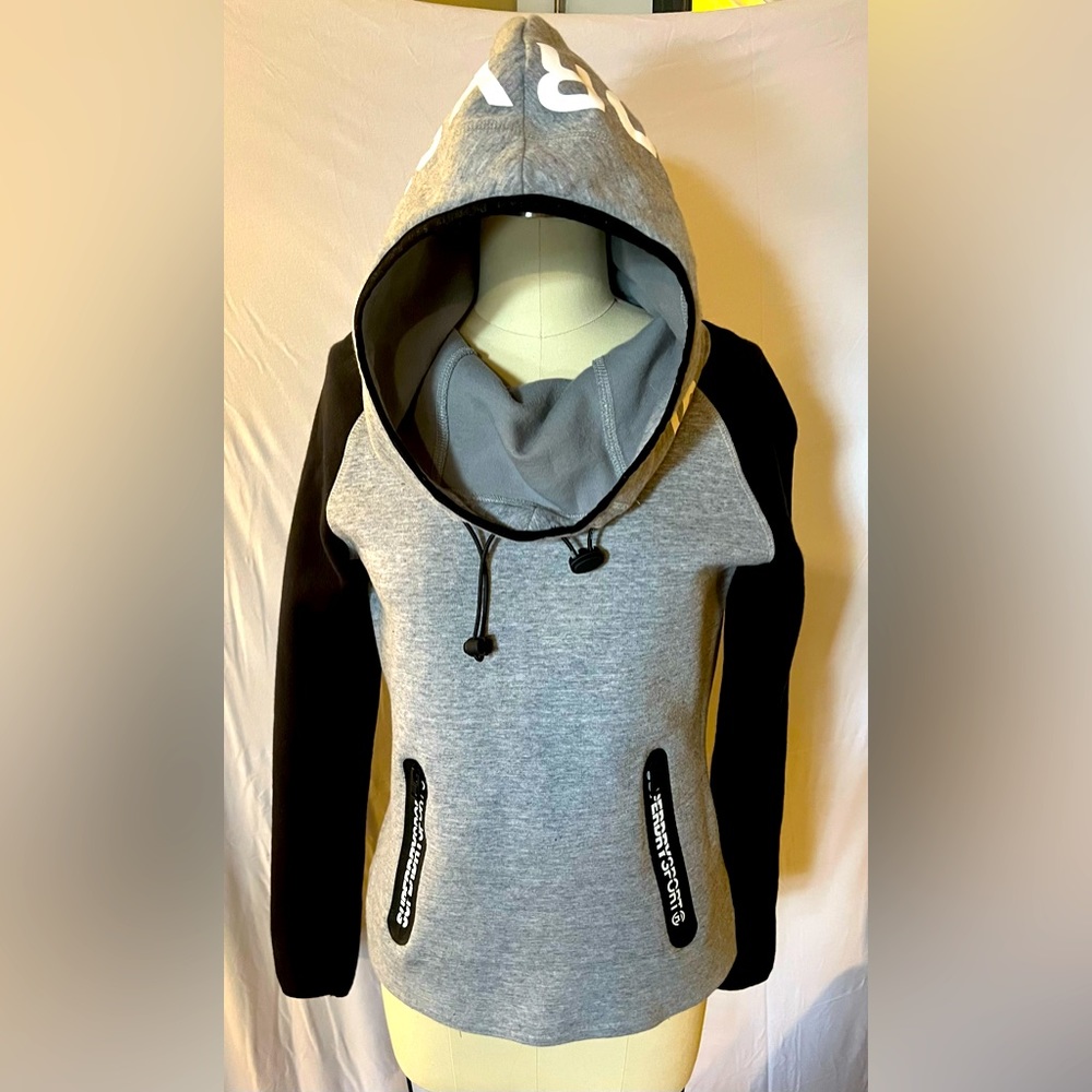 Superdry. Women’s XS. Gray and Black athletic top.